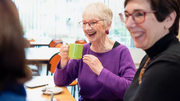 People drinking tea/coffee together